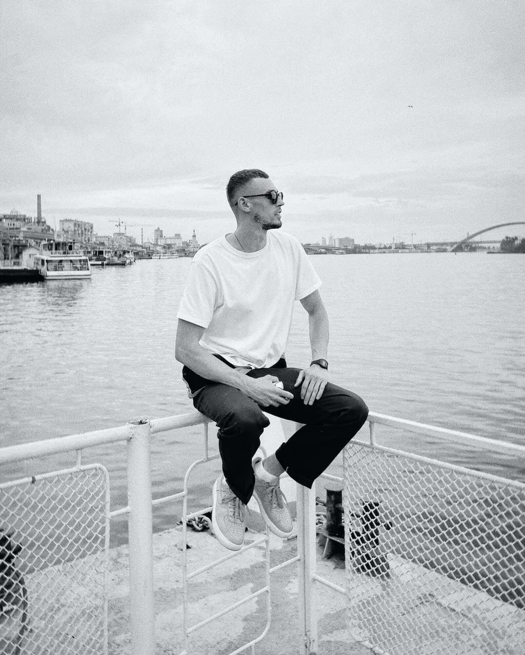 producer KLIM sitting by a river