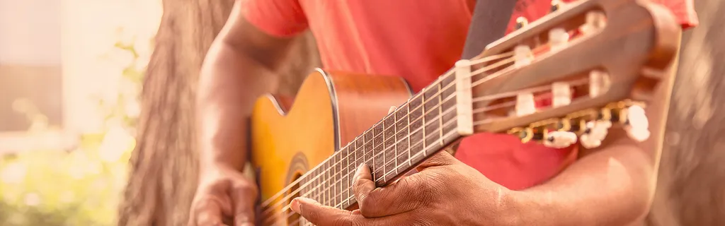 man playing a guitar