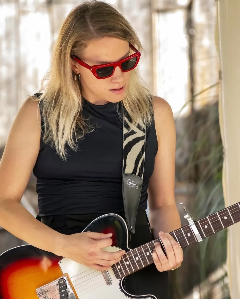 Noelia playing the guitar