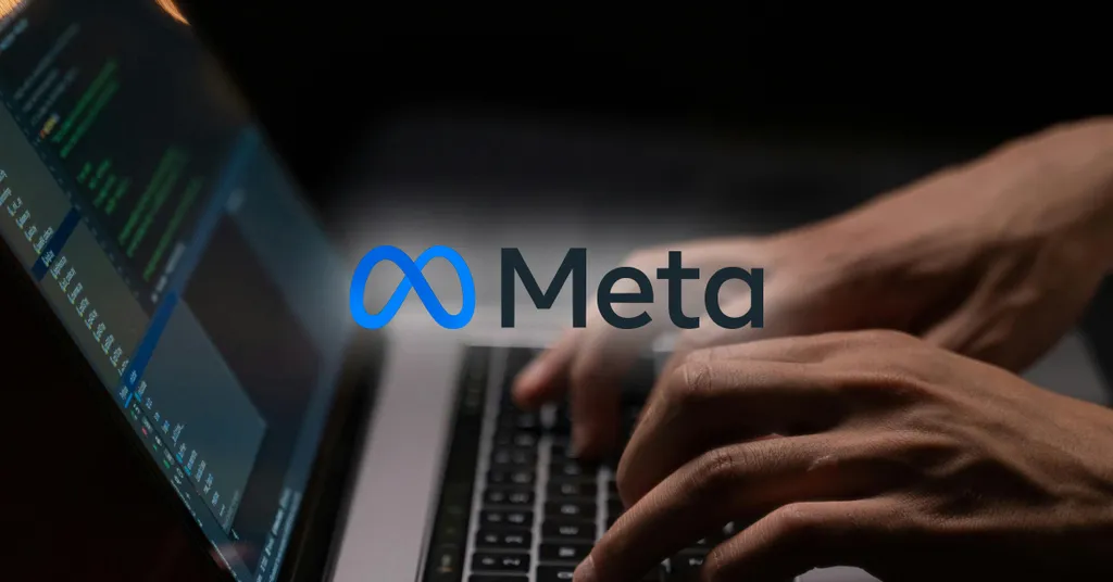 Hands typing on laptop keyboard with Meta logo overlay and code visible on screen in background.