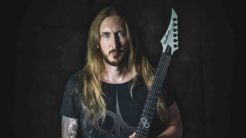Ola Englund Artist Photo with guitar
