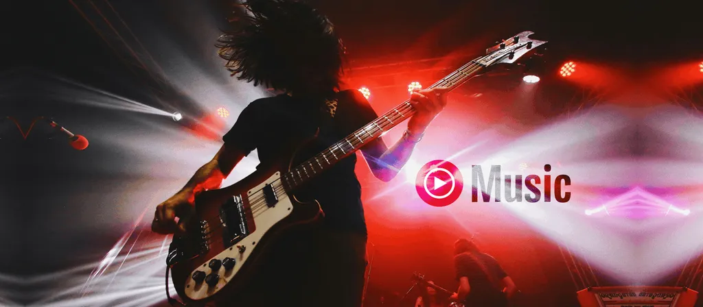 Silueta de guitarrista en escenario con luces rojas y blancas, logo "Music" visible, humo y efectos de iluminación dramática.