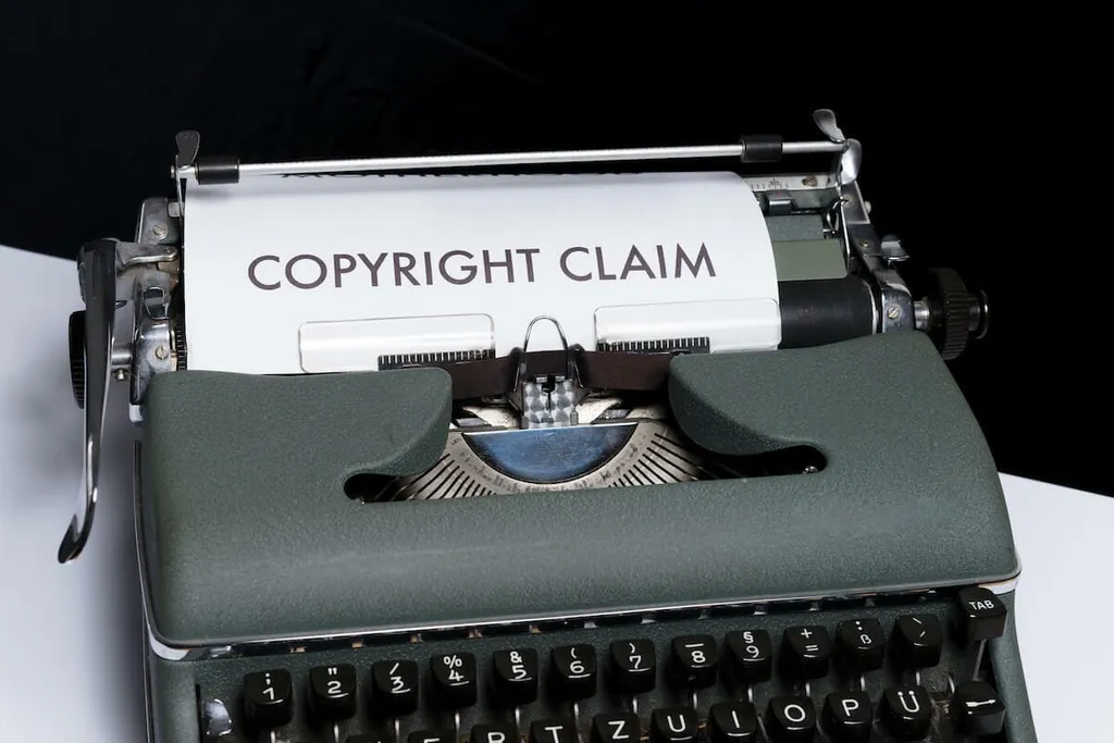 typewriter with paper that says copyright claim