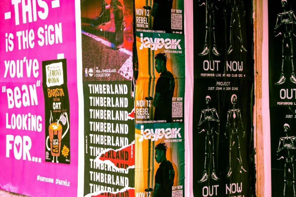 music posters hanging on wall