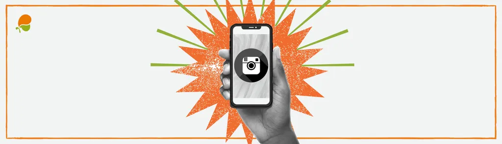 Mano sujetando smartphone con icono de Instagram