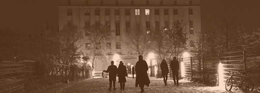 People at the door of the Berghain club in winter