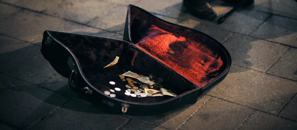 open music instrument case with money