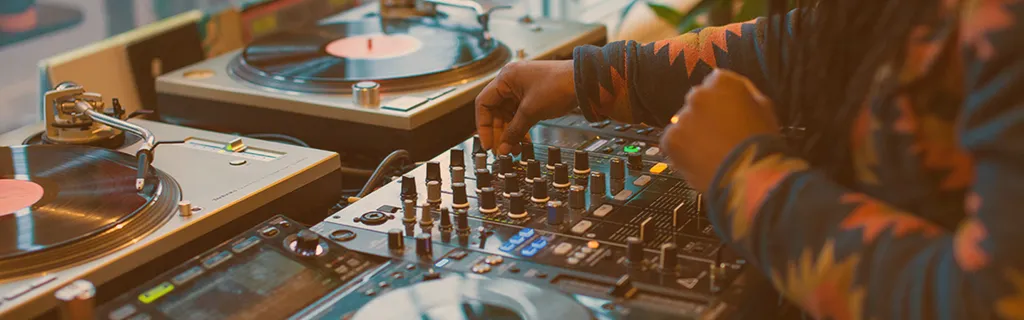 DJ mixing and mastering vinyl records